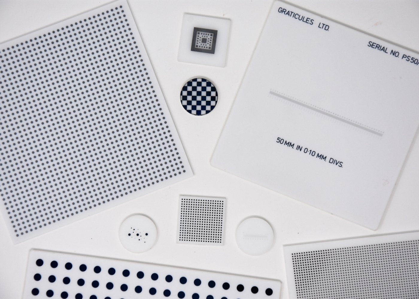 White Glass Reticles, Resolution Charts, Scales, Dot Arrays and Chequerboards